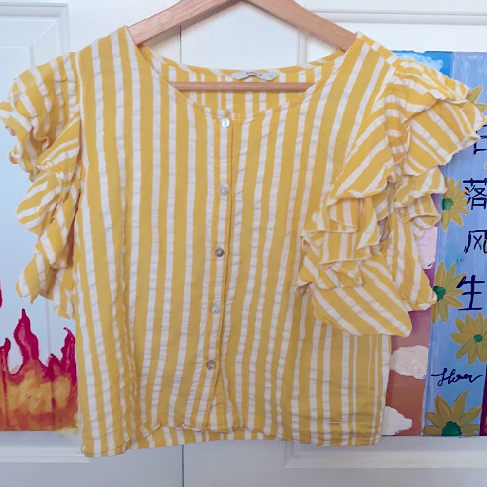 Yellow ruffled button down top